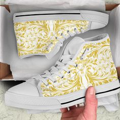 White and Gold Colored High Top shoes Birthday Gifts for Her Unisex Adult Shoes  PRODUCT INFORMATION * Full canvas double sided print with rounded toe construction. * Lace-up closure for a snug fit. * Soft textile lining with lightweight construction for maximum comfort. * High-quality EVA outsole for traction and exceptional durability. * Custom Printed Item - Please allow 15-22 days for delivery. Thank you for visiting! Luxury Yellow High-top Sneakers With Laces, Hippie Women, Hippie Men, Dark Denim Jeans, High Top Shoes, Color Print, Dinosaur Print, Top Shoes, Canvas Shoes