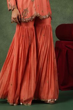 Peach kurta with zardozi, sequin embroidery on neckline, sleeves and buttis spread all over in floral pattern. Paired with tiered embroidered sharara and dupatta. - Aza Fashions Embroidery Zardozi, Embroidered Sharara, Kurta Sharara Set, Jayanti Reddy, Kurta Sharara, Tarun Tahiliani, Sequin Embroidery, Sharara Set, Sequins Embroidery