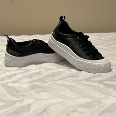 Super Cute Girls Black Tennis Shoes With White Base. Rhinestone Bling On The Back With An Iridescent Pull Tab. Smoke And Pet Free Home. Black And White Bling Converse Toddler, Black Tennis Shoes, Girl Sneakers, Girls Black, Girls Sneakers, Pull Tab, Tennis Shoes, Girls Shoes, Kids Shoes