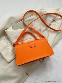 BagForLove - Compact Orange Flap Bag with Delicate Stitching - Perfect for Everyday Use Product Description Color Orange Type Square Bag Bag Size Small Strap Type Top Handle Pattern Type Plain Closure Type Magnet Style Fashionable Features Lightweight Coating 100% Polyurethane Composition 100% Polyurethane Material PU Leather Size Chart INCH CM Strap Length Bag Length Bag Width Bag Height Handle Height 47.2 inch 8.7 inch 3 inch 4.7 inch 2.8 inch Strap Length Bag Length Bag Width Bag Height Handl Rectangular Box Bag For School, Rectangular Satchel For School In Spring, School Square Baguette Bag, Trendy Orange Bag For Daily Use, Square Baguette Bag For School, Rectangular Spring School Satchel, Orange Box Bag With Large Capacity For Daily Use, Large Capacity Square Orange Bag, Large Capacity Orange Square Bag