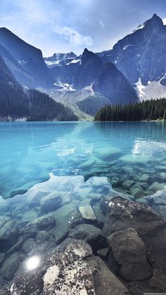 an image of the water and mountains with a quote on it that says, don't work & hours for a company and then go home and not work on your own