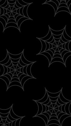 a black and white spider web background