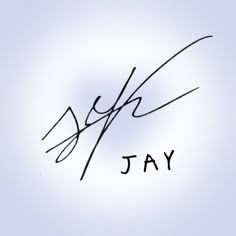 an image of jay signed on the back of a wall with blue sky in the background