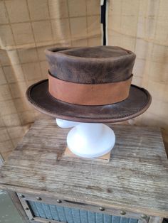 Handmade all natural veg-tanned leather top hat. Hand stitched with wax thread. Please contact me with any questions or custom orders. please put your head measurements in the personalization. Leather Top Hat, Brown Leather Top, Costume Hats, Top Hat, Leather Top, Costume Accessories, Your Head, Hand Stitched, Hand Stitching