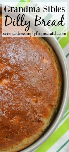 a cake in a pan sitting on top of a green and white striped table cloth