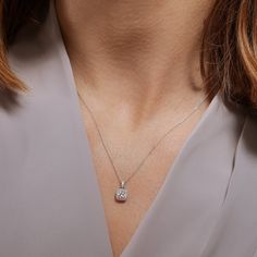 Our Zoey necklace is beautifully crafted in 9 carat white gold and set with 0.33ct of lab grown diamond. This elegant cushion shape pendant is set with a lab grown diamond centre stone framed by a halo of pavé set diamonds. Our Zoey necklace is partnered with an 18 inch gold chain. Product Information Metal Height Width Certificate 9ct gold 12.1 7.1 Authenticity Certificate Lab Grown Diamond Information Total Carat Weight Colour Clarity Shape 0.33ct G VS2 Round Authenticity Certificate, White Gold Chains, Halo Pendant, Cushion Diamond, Yellow Gold Chain, Gold Chain, Lab Grown, Gold Chains, Lab Grown Diamonds