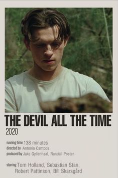 the devil all the time movie poster with young man in white shirt looking at camera