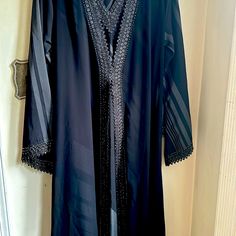 Brand New Never Worn Abaya Black Long Sleeve Kaftan For Eid, Black Maxi Length Kaftan With Dabka, Long Black Abaya For Eid, Black Maxi Abaya For Eid, Black Maxi Length Abaya For Eid, Black Long Thobe For Eid, Evening Black Abaya With Dabka, Black Maxi Length Thobe For Eid, Black Long Thobe With Dabka