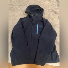 Size Large. Very Nice Jacket. Zippers And Velcro To Stay Bundled Up. Never Worn. Perfect Condition. Navy And Bright Blue Accents. Blue Weatherproof Long Sleeve Hooded Jacket, Blue Weatherproof Hooded Jacket For Fall, Blue Waterproof Hooded Jacket For Fall, Blue Waterproof Hooded Jacket, Blue Waterproof Hooded Jacket With Long Sleeves, Weatherproof Long Sleeve Blue Outerwear, Blue Long Sleeve Weatherproof Outerwear, Casual Blue Weatherproof Hooded Jacket, Blue Weatherproof Outerwear