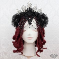 You'll be the queen of the night in this beautiful gothic Vampire crown.  It's a stunningly detailed piece - with layered venice lace appliques in front, draping crystal-cut glass beads. and flowers of varying textures - soft crystal organza and shining satin. - .v. - About my Crowns - .,_.^._,. - When I first started my business way back in 2006, I made headdresses for belly dancers.  They were designed to be easy to place (for quick costume changes) and they had to stay put too - thru twirls, shimmies, and more. Today, I use the same techniques to make my crowns.  The end result is a piece that goes on incredibly easily, and stays put perfectly thru all your costumed adventures. .v. --- Costume --- .,_.^._,. Do you like the full costume in the final photo?  Purchase it here: https://www. Gothic Crown Headpiece For Masquerade, Gothic Tall Crown For Costume, Gothic Crown With Round Crown For Festival, Gothic Crown For Festivals With Round Crown, Gothic Round Crown For Festival, Gothic High Crown Headpiece For Costume Party, Gothic Tall Crown For Festivals, Gothic Headpiece For Costume Party, Gothic Fitted Headpiece For Festival