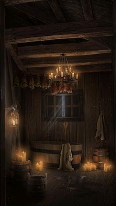 an old fashioned bathroom with candles in the bathtub and wooden barrels on the floor