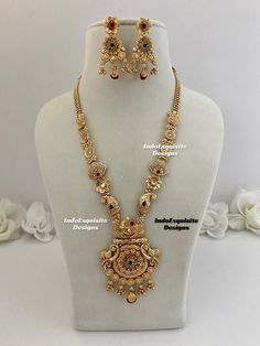 Matt gold finish Raani Haar(long necklace) comes with Earrings/bridal jewellery/south Indian long necklace Set/Rajwadi Rani Haar/Guttapusalu necklace/ one 1 gram gold/Ruby Green  All items are shipped from Brampton, Ontario, Canada. If you need your item by a certain day, please reach out to us for express delivery option before placing the order so that we can update the shipping for you. Standard shipping/delivery timeline Below are the estimated delivery times after the order is shipped/dispatched.  ---> USA delivery timeline * 3-5  business days to major urban centers in USA. It may take 2-3 days extra to remote locations ---> Canada delivery timeline  * 2-3 business days - GTA  & Montreal  * 2-4  business days - Rest of Ontario/Quebec * 4-6 business days-  Rest of Canada (Please consi Cheap Traditional Long Necklace, Gold Necklace Women Kameswari Jewellers, Luxury Bridal Meenakari Temple Necklace, Luxury Gold Temple Necklace With Elegant Design, Luxury Multicolor Temple Necklace With Tilla, Luxury Brass Temple Necklace For Weddings, Luxury 22k Gold Bridal Necklace With Stone Work, Gold Long Rani Haar Designs, Luxury Kundan Temple Necklace In Yellow Gold