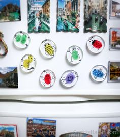 the magnets on the refrigerator are decorated with pictures