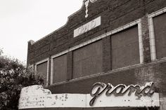 an old building with the word grand written on it