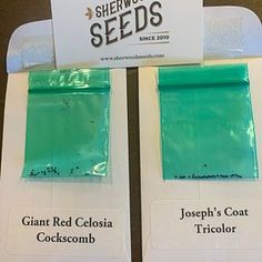 two bags of seeds sitting on top of each other