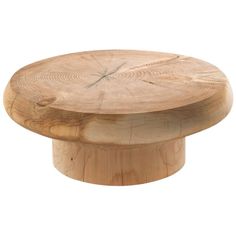 a wooden table that has been made out of wood and is sitting on a white surface