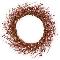 a round wreath with red berries on it