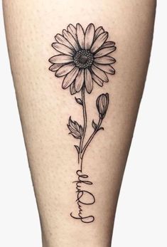 a sunflower with the word love written in cursive writing on its lower leg