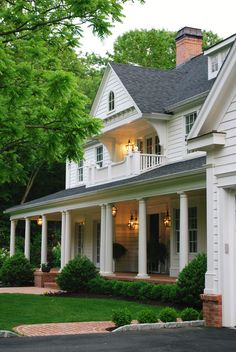 a large white house with lots of windows