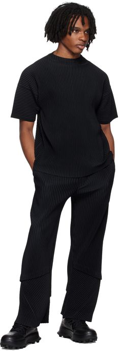 Garment-pleated polyester tricot T-shirt. · Mock neck · Dropped shoulders Supplier color: Black Chic Black Pleated Top, Black Short Sleeve Viscose Top, Black Tops With Ribbed Neckline For Work, Black Tops With Ribbed Neckline, Modern Black Ribbed Top, Casual Stretch Pleated Tops, Casual Pleated Stretch Tops, Black Pleated Tops For Spring, Spring Black Pleated Tops