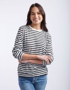 DESCRIPTION Embrace casual comfort with the Long Weekend Top in White/Black Stripe by White & Co. This top is designed for comfort and style, featuring a relaxed fit, crew neckline, and long sleeves. The crisp white base with black stripes brings a classic look perfect for casual days. This top ensures all-day comfort, making it an ideal choice for weekend wear or a relaxed day out. Team the Long Weekend Top with rolled-up jeans and white sneakers for a casual yet chic look. This versatile top s Black Long Sleeve Crew Neck Top For Spring, Casual 3/4 Sleeve Tops For Everyday, Casual Crew Neck Long Sleeve Top For Work, Black Relaxed Fit Long Sleeve Casual Top, Black Casual Long Sleeve Top With Relaxed Fit, Spring Black Long Sleeve Top With Relaxed Fit, Black Relaxed Fit Long Sleeve Top For Spring, White Cotton T-shirt With Striped Sleeves, White T-shirt With Horizontal Stripes, Relaxed Fit