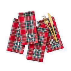 red and green plaid napkins with gold forks