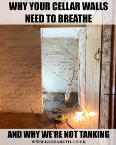 an open door leading into a room with a brick wall and light on the floor