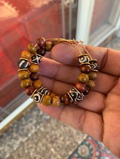 Hoops With Beads, Things To Shop For, Wooden Bracelets, Wooden Bead Jewelry Ideas, African Jewellery, Wood Bead Jewelry, Earthy Colorful Beaded Jewelry For Festivals, Handmade Black Earthy Jewelry, Earthy Jewelry Aesthetic