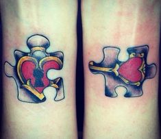 two matching tattoos on the legs of people with heart and puzzle pieces tattooed on them