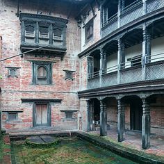 an old building with lots of windows and balconies