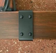 a close up view of a wooden door handle