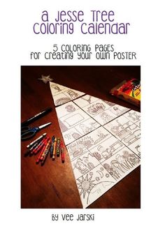 a coloring book with crayons and markers on the table