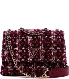 From Guess&#x2C; the Tali Burgundy Mini Convertible Crossbody Flap Bag features:Quilted tweed trim: Pebble PUShiny gold hardwareFlap with 2 mag snap closureInterior pockets: 1 zip&#x2C; 6 CCExterior details: back zip pocket&#x2C; feet2 compartmentsConvertible crossbody strap approx. 12.6" shoulder drop&#x2C; 22.50" detach dropApprox. dimensions: 9.65" x 2.75" x 6.7"Imported. Crossbody Guess, Guess Shoulder Bag, Tweed Handbag, Tweed Bag, Mini Convertible, Guess Handbags, Guess Bags, Triangle Logo, Mini Crossbody Bag