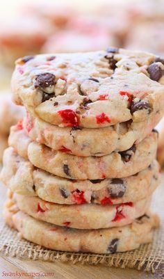 a stack of cookies sitting on top of a wooden table