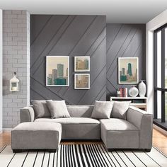 a living room with a large gray couch