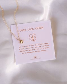 Bring luck to your life with this dainty Four Leaf Clover Luck Necklace! Power up your good fortune with the unique charm of this whimsical necklace! The four-leaf clover is a classic symbol of hope, faith, love and luck. It brings serendipity into your life. Let it guide you to happiness and good fortune. NECKLACE FEATURES Chain: 14K Gold-filled Cable Chain Charm: 9x6mm Brass, 18K Gold-plated with cubic zirconia Each necklace comes with a "Good Luck Charm" card Inspirational Charm Necklaces As Gift, Minimalist Personalized Good Luck Necklace, Dainty Charms Necklace For Best Friend Gift, Dainty Charms Necklace For Best Friend, Dainty Charm Necklaces For Best Friend Gift, Dainty Round Pendant Charm Necklace For Good Luck, Dainty Good Luck Jewelry With Flower Pendant, Dainty Flower Pendant Jewelry For Good Luck, Dainty Delicate Chain Jewelry For Good Luck