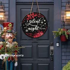 a christmas decoration on the front door of a house