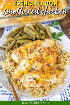 french onion smothered chicken on a plate with rice and green beans