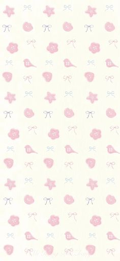 a pink and blue wallpaper with small bows on the top, and smaller bows on the bottom