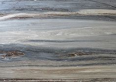 an abstract painting with grey and white lines on the surface, as if it were painted in acrylic paint