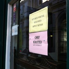 a sign that is on the side of a door saying, butcher porter required applyy within