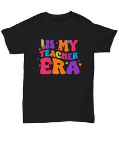 In My Teacher Era T-shirt, School Principal Tshirt, Teacher Appreciation Tee Shirt, Father's Day Tee, Mother's Day T-shirt, Teacher's Day T - Printed, Made, And Shipped From The USA.  - Double-needle stitched. Fun Letter Print T-shirt For End Of School Year, End Of School Year Fun T-shirt With Letter Print, Fun Text Print T-shirt For School Year End, Fun T-shirt With Funny Print For Teacher Appreciation, End Of School Year Graphic Print T-shirt Gift, Graphic Print T-shirt For End Of School Year Gift, Funny Slogan T-shirt For Teacher Appreciation, Funny Crew Neck T-shirt For End Of School Year, Funny Black T-shirt For End Of School Year