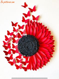 a large red flower surrounded by lots of small red butterflies on a white background with text overlay