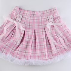 The cutest plaid skirt with fluffy trim and satin bow tie detailing. Available in blue or pink. Material: Polyester and spandex SIZE S: WAIST 65CM, HIP 91CM, LENGTH 38CM SIZE M: WAIST 69CM, HIP 95CM, LENGTH 39CM SIZE L: WAIST 73CM, HIP 99CM, LENGTH 40CM Pink Harajuku Ruffle Skirt, Harajuku Style Pink Ruffled Skirt, Pink Harajuku Skirt With Ruffles, Cute Fitted Winter Skirt, Harajuku Style Pink Skirt, Pink Harajuku Mini Skort, Harajuku Style Pink Ruffled Bottoms, Harajuku Pink Mini Skort, Pink Harajuku Style Skort