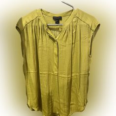 Beautiful Silk Sleeveless Top In Greenish/Yellowish Color. Brand New With No Tags. Casual Yellow Vest For Spring, Casual Yellow Tank Vest, Casual Yellow Sleeveless Blouse, Casual Sleeveless Yellow Blouse, Yellow Sleeveless Cotton Blouse, Summer Yellow V-neck Vest, Yellow V-neck Summer Vest, Yellow Summer V-neck Vest, Second-skin Sleeveless Lined Camisole