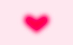 a red heart on a pink background