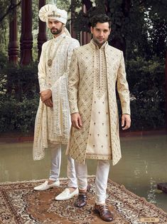 Cream Colour Handcrafted front open Designer Sherwani for groom with elegant kurta style jacket inside made from the finest silk fabric will make you feel like a king on the happiest & most important day of your life.you can customize it according to your measurement as the fitting make it more beautiful to wear.Its beautifully hand embroidered and zari work all over and on sherwani jacket.Elegant sherwani for groom,groom sherwani,sherwani for men sherwani men,indowestern for men COST INCLUDED S New Sherwani Design 2022, Designer Sherwani For Men Grooms, Dark Colour Sherwani For Groom, Nikha Outfits For Men, Cream Colour Sherwani For Men, Jacket Sherwani For Men, Groom Wedding Outfits For Men, Wedding Dresses Men Indian Style, Wedding Sherwani For Groom Latest