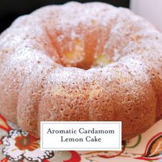 a lemon cake sitting on top of a plate