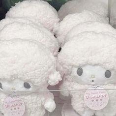 hello kitty stuffed animals are on display in a store