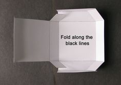 an origami box that says fold along the black lines